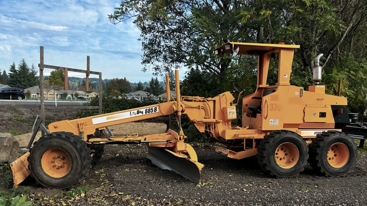 Grader used for road work, driveway leveling, and finish grading